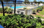 Swimming Pool 4 Days Inn by Wyndham Titusville Kennedy Space Center