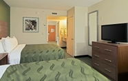 Bedroom 6 Quality Suites Lake Wright - Norfolk Airport