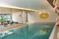 Swimming Pool Ramada by Wyndham Nuernberg Parkhotel