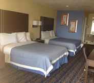 Bedroom 4 Days Inn by Wyndham San Antonio Northwest/Seaworld