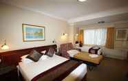 Kamar Tidur 4 Twin Towers Inn