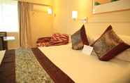 Kamar Tidur 6 Twin Towers Inn