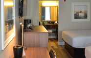 Bedroom 2 Opal Hotel & Suites