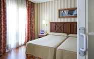 Kamar Tidur 3 Hotel ILUNION Alcora Sevilla