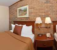 Bedroom 4 Days Inn by Wyndham Batesville AR