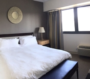 Phòng ngủ 3 Stamford Suites