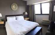 Bedroom 3 Stamford Suites