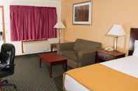 Bedroom Budget Inn and Suites