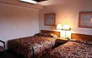 Bedroom 3 Rodeway Inn & Suites