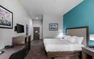 Bedroom 2 Clarion Inn & Suites DFW North