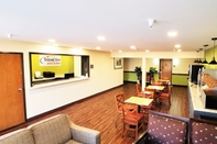 Lobby Travel Inn & Suites