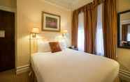 Kamar Tidur 6 The Andrews Hotel