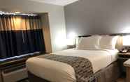 Bedroom 6 Microtel Inn & Suites by Wyndham Baton Rouge