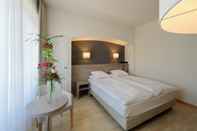 ห้องนอน Hotel De La Rose
