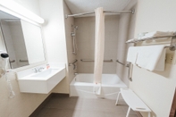 In-room Bathroom Super 8 by Wyndham Danbury