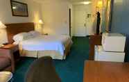 Bedroom 3 Travelodge Suites by Wyndham MacClenny