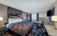 Bedroom 6 Super 8 by Wyndham Kansas City at Barry Road/Airport