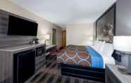 Bedroom 5 Super 8 by Wyndham Kansas City at Barry Road/Airport