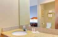 In-room Bathroom 5 Super 8 by Wyndham Smithfield/Selma