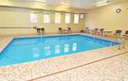 Swimming Pool 7 SureStay Plus Hotel by Best Western Topeka Northwest