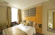 Kamar Tidur 4 Woodlands Park Hotel