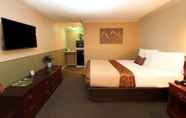 Kamar Tidur 6 Family Garden Inn & Suites