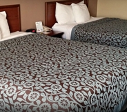 Bedroom 6 Days Inn by Wyndham Collinsville/St. Louis