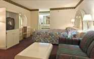 Bedroom 3 Days Inn & Suites by Wyndham Stockbridge South Atlanta