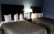 Bedroom 7 Days Inn & Suites by Wyndham Peachtree Corners/Norcross
