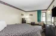 Bedroom 4 Days Inn & Suites by Wyndham Peachtree Corners/Norcross