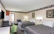 Bedroom 3 Days Inn & Suites by Wyndham Peachtree Corners/Norcross