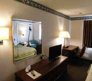 Kamar Tidur 7 Days Inn by Wyndham Lexington NE