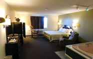 Bedroom 3 Days Inn by Wyndham Lexington NE