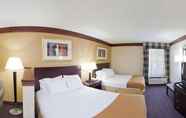 Bedroom 3 Days Inn & Suites by Wyndham Tahlequah