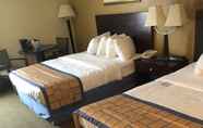Bedroom 5 Days Inn & Suites by Wyndham Tahlequah