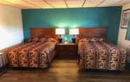 Bedroom 5 Econo Lodge