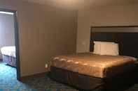 Bedroom SureStay Hotel by Best Western Brownsville