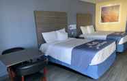 Bedroom 3 Days Inn by Wyndham Okmulgee