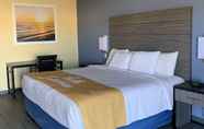 Bedroom 6 Days Inn by Wyndham Okmulgee