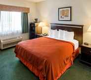 Bedroom 3 Quality Inn near Northtown Mall & National Sports Center