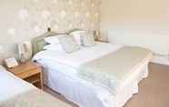 Kamar Tidur 4 Woodland Manor Hotel