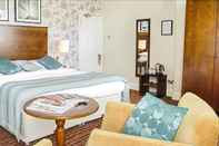 Kamar Tidur Classic Lodges - The White Swan