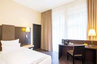 Bedroom 4 NH Frankfurt Villa