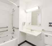 In-room Bathroom 6 Super 8 by Wyndham Bloomington