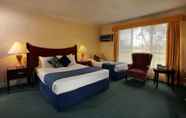 ห้องนอน 6 Golf Place Inn