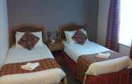 Kamar Tidur 7 County Hotel