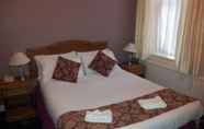 Kamar Tidur 4 County Hotel