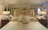 Kamar Tidur 3 The Milestone Hotel