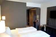 ห้องนอน PLAZA Premium Parkhotel Norderstedt