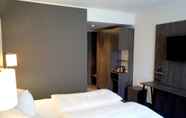 Bedroom 4 PLAZA Premium Parkhotel Norderstedt